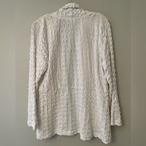 Very textured lightweight jacket.